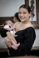 a person holding a baby