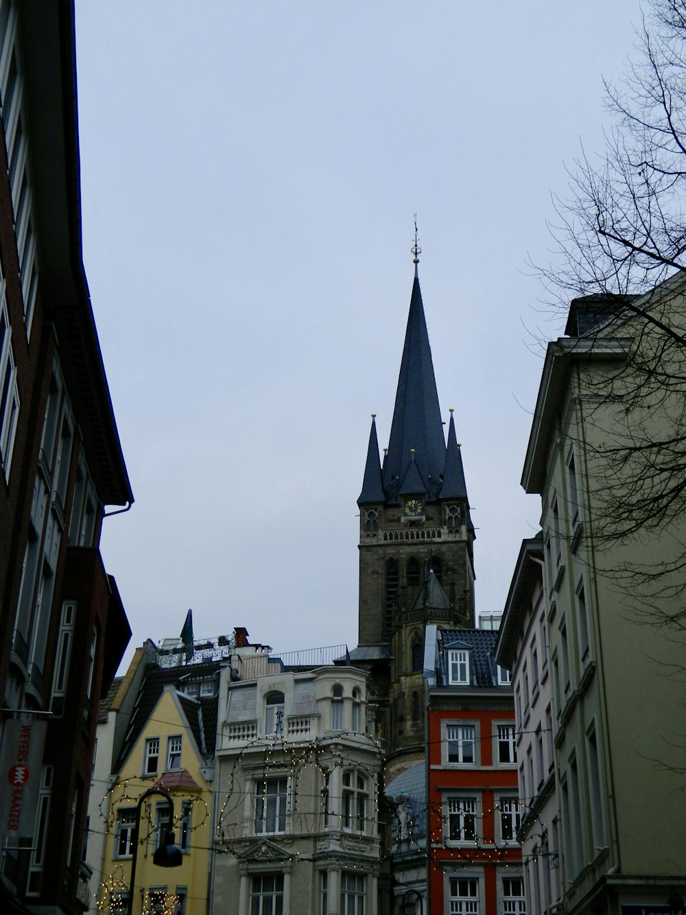 a group of buildings with a steeple