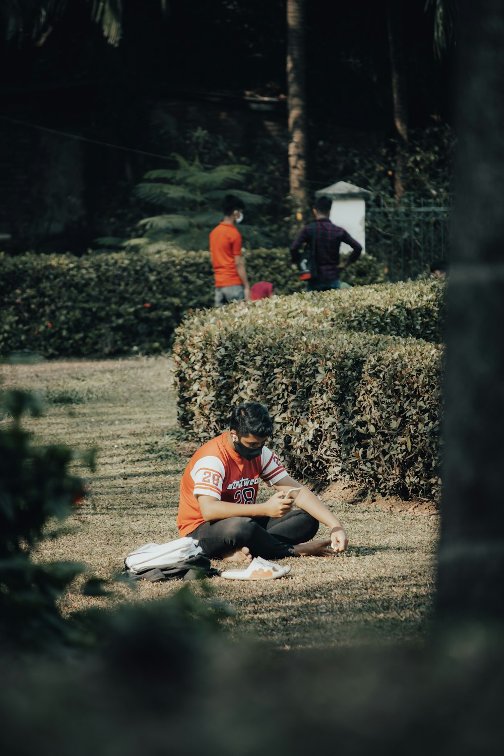 a man kneeling on the ground