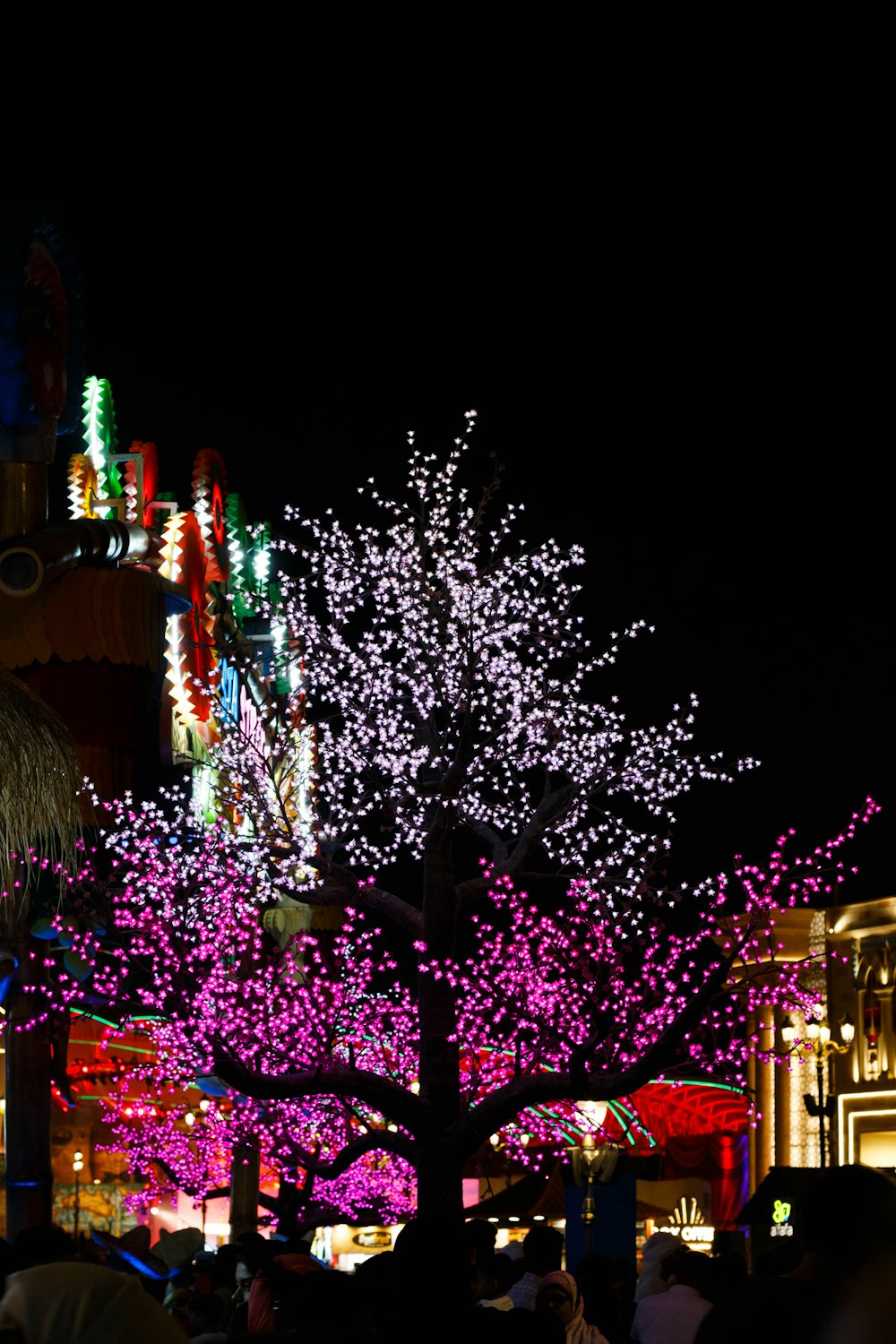 a tree with lights at night
