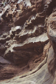 Detailed view of blasting charges carefully placed in a natural rock formation.