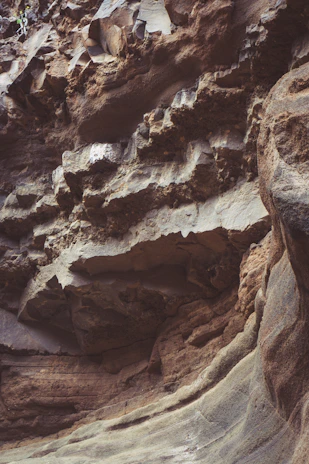 Detailed view of blasting charges carefully placed in a natural rock formation.