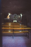 Interior view of a warm, softly lit funeral chapel
