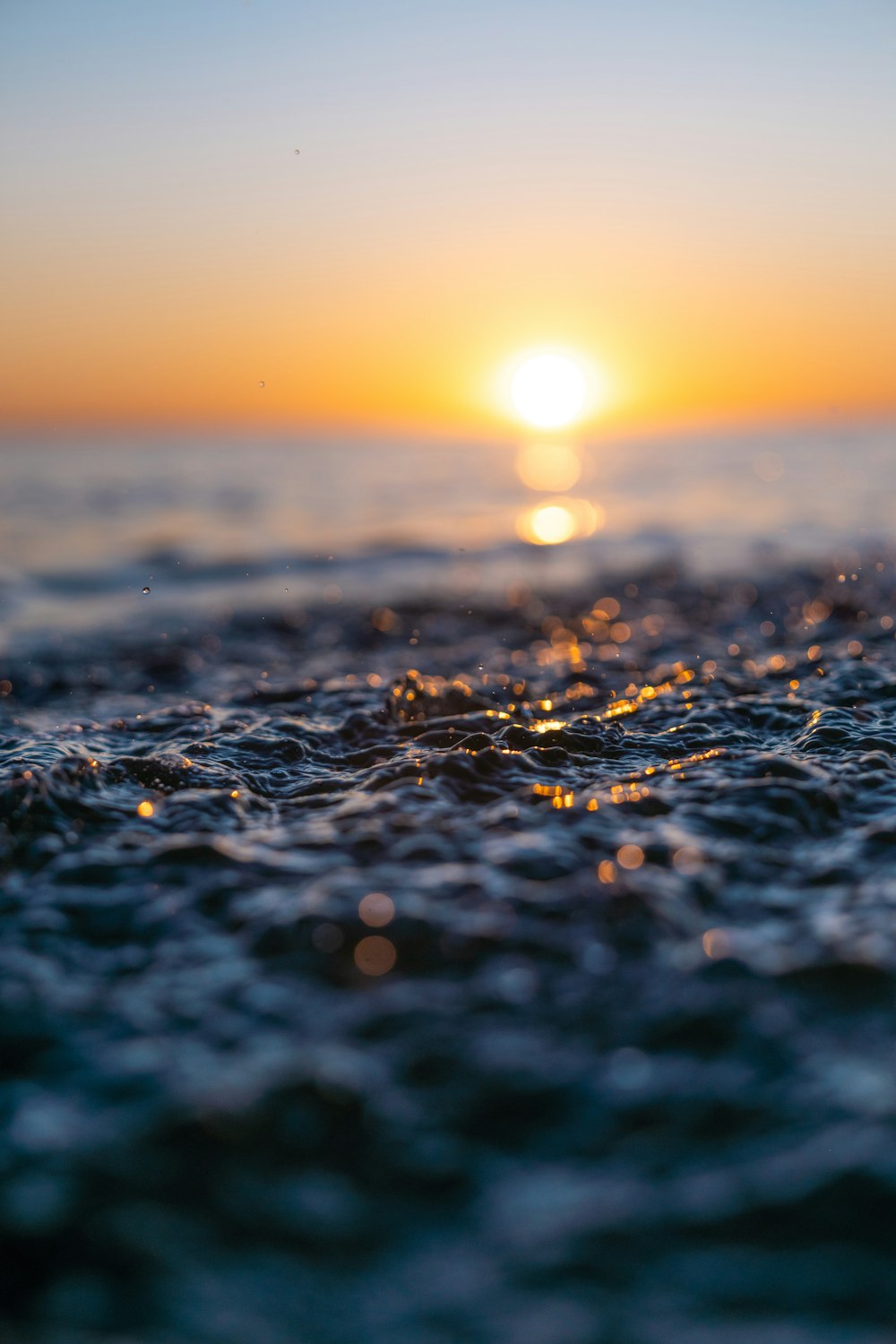 a sunset over a beach