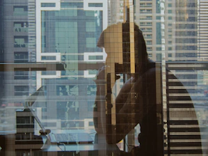 a person standing in front of a window