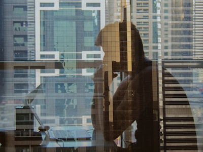 a person standing in front of a window