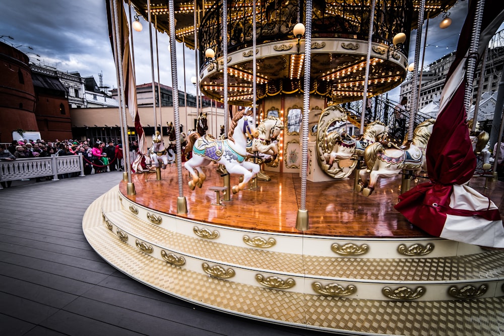 a group of people on a merry go round