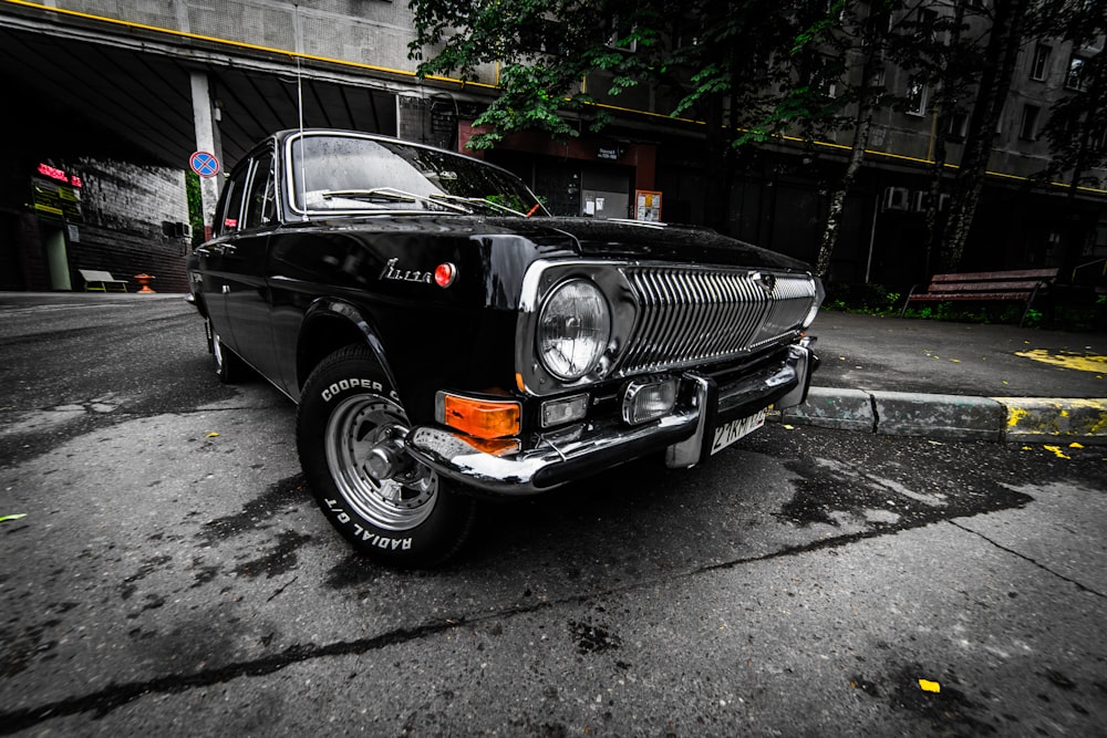 a black car parked on a street