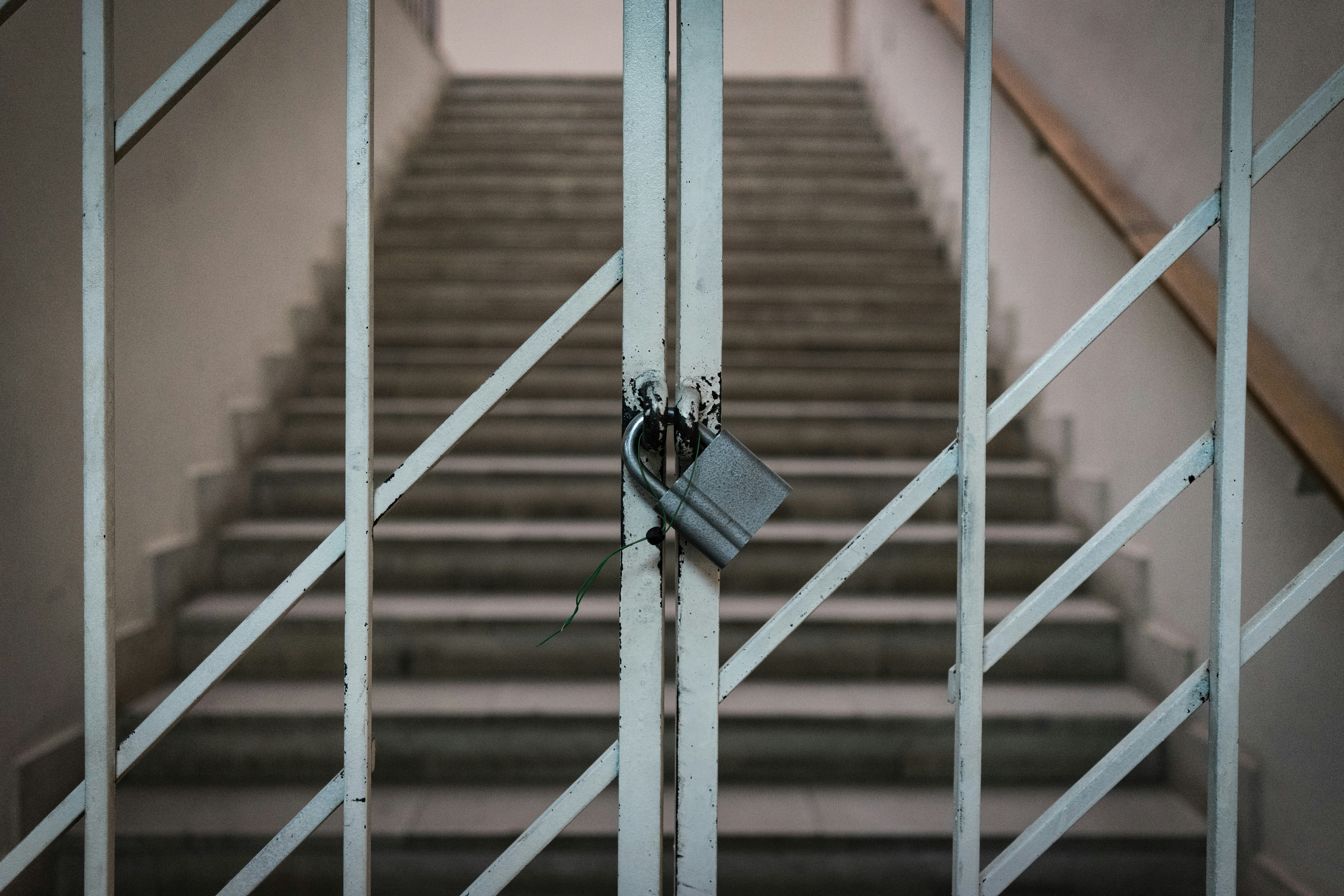 a staircase with metal railings