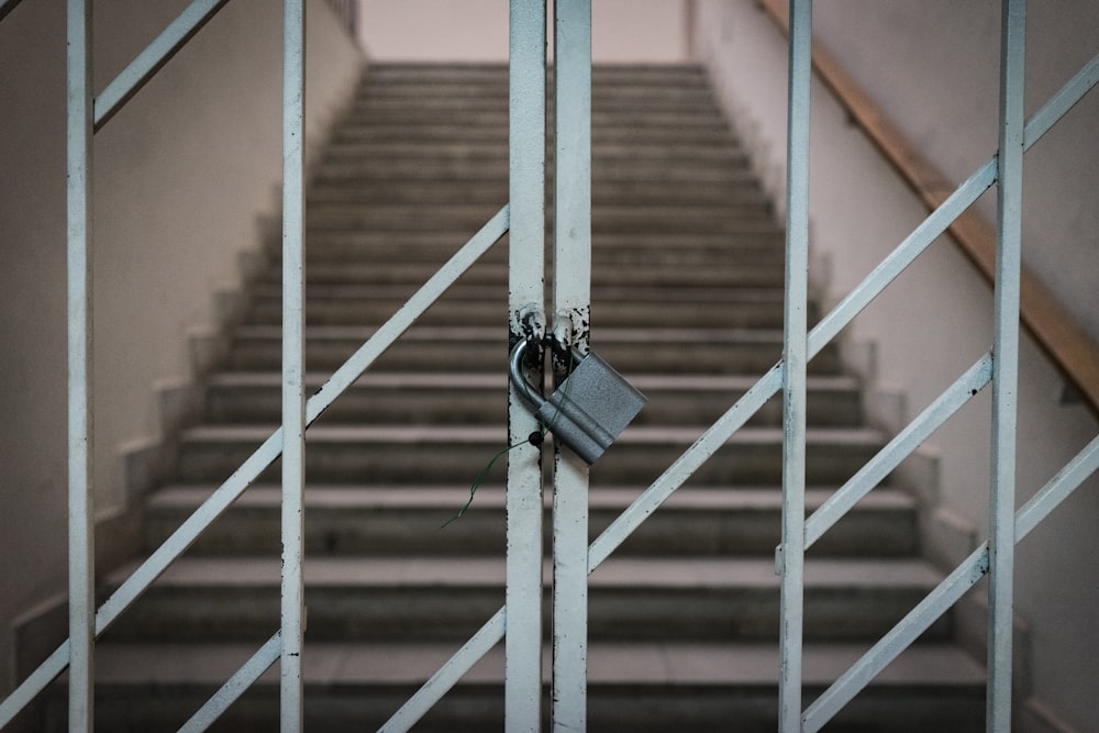 a staircase with metal railings