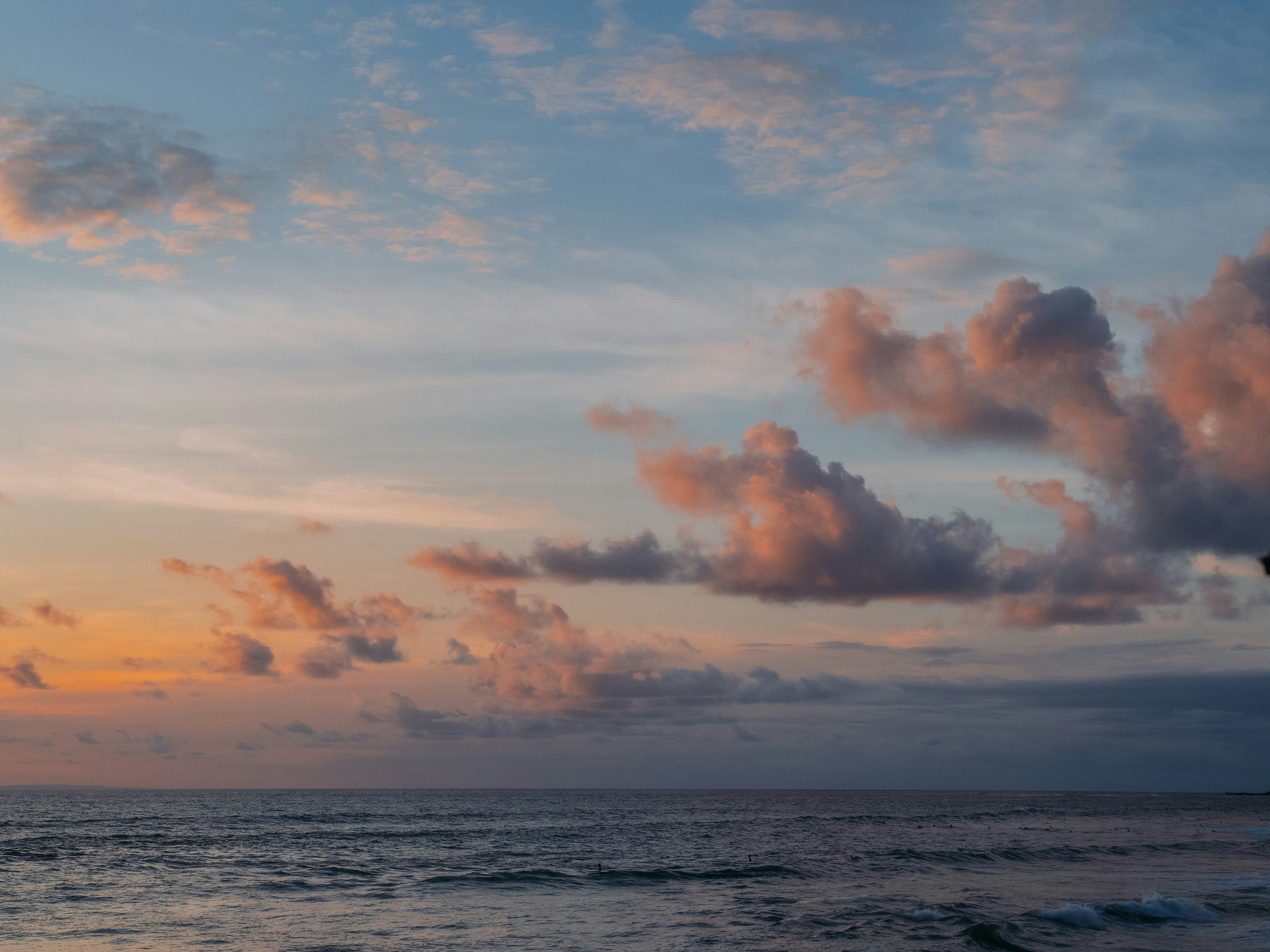 a body of water with clouds above it, Amazing clouds at sunset