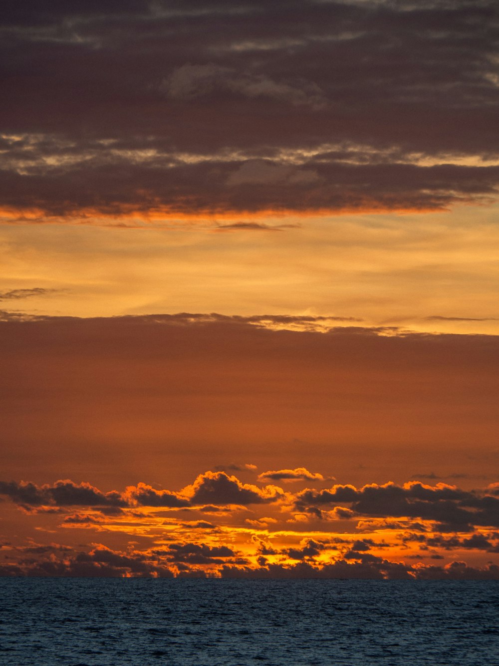 a sunset over the water