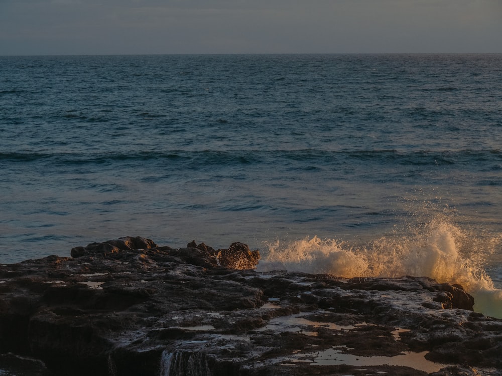 waves crashing on rocks