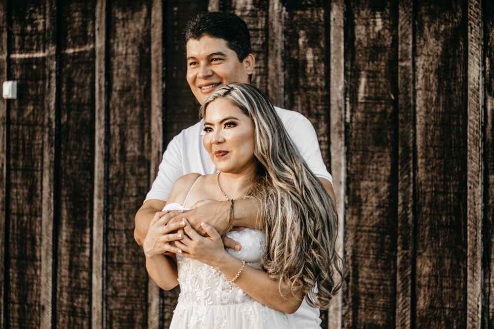 a man and woman posing for a picture