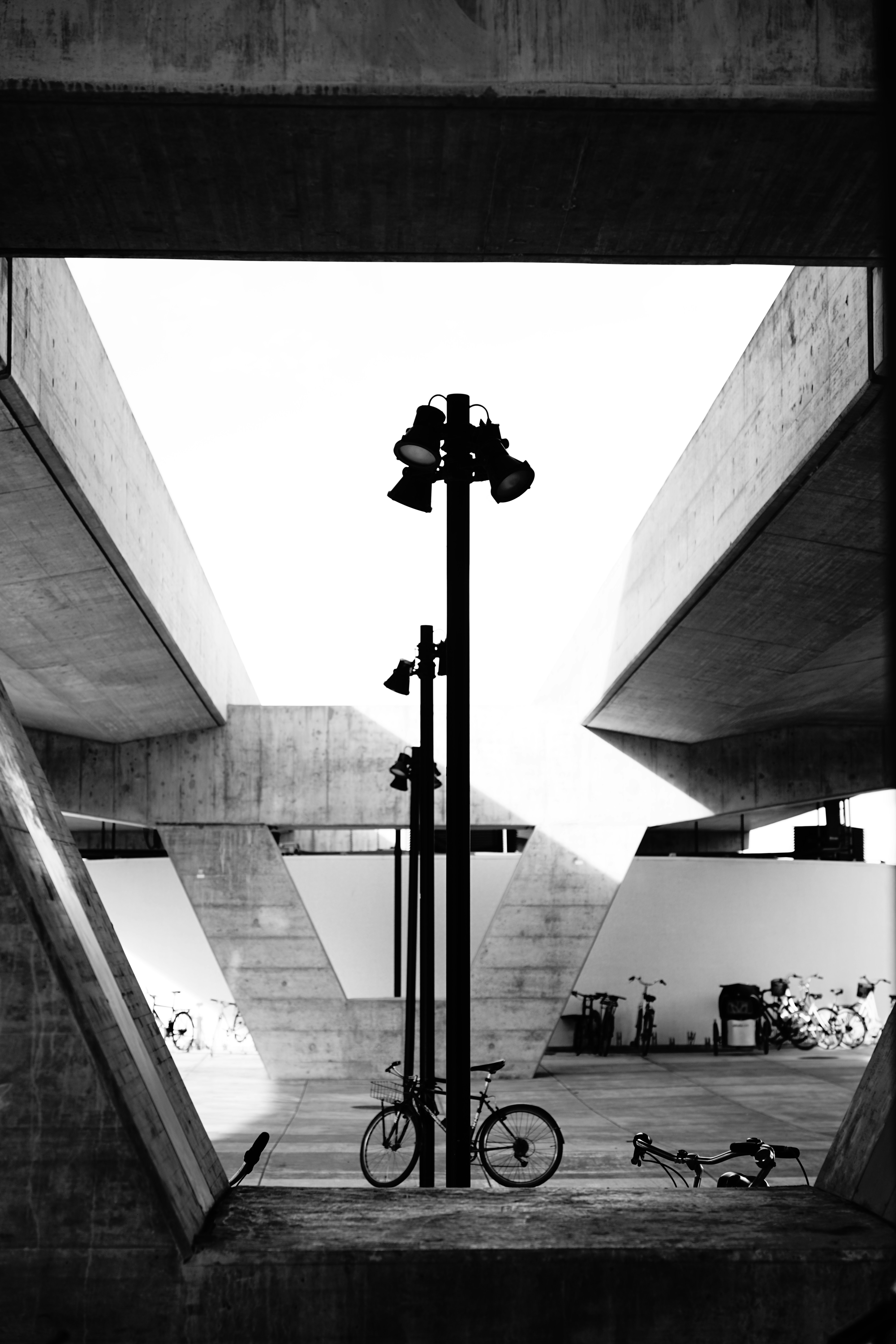 a bicycle parked on a sidewalk