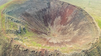 A stunning view of a volcanic crater at Volcanoes National Park.