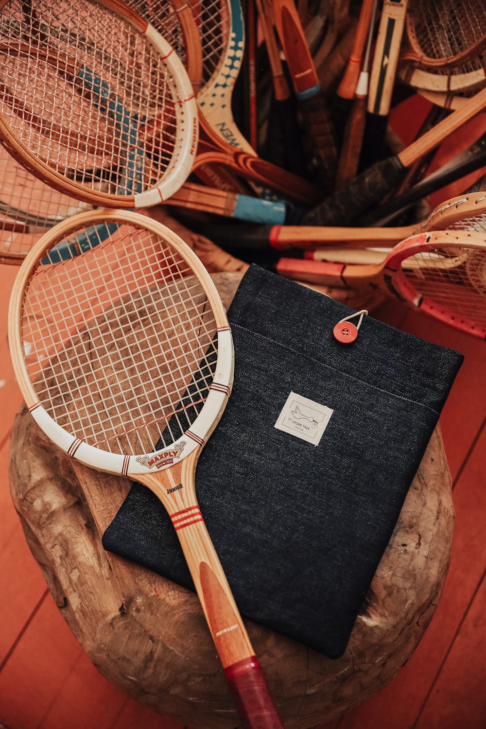 a tennis racket and a bag