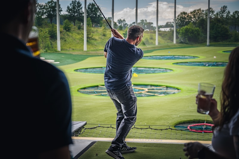 A person swinging a golf club