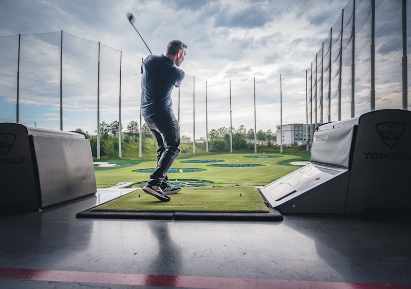 A man playing golf