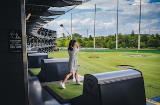 a person standing on a golf course
