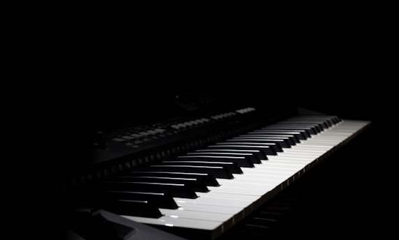 a piano keyboard with a black background