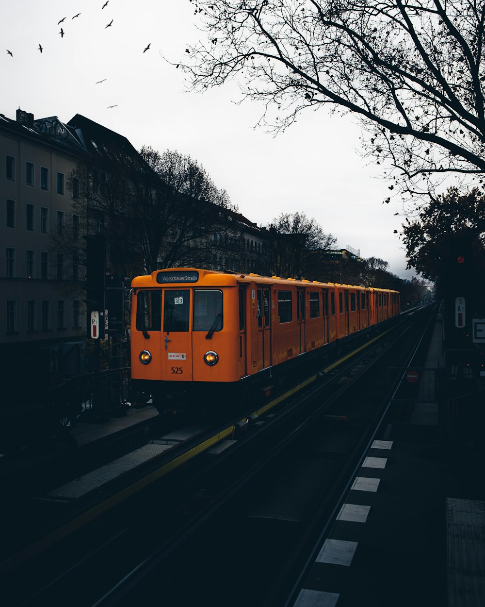 a train travels down the tracks