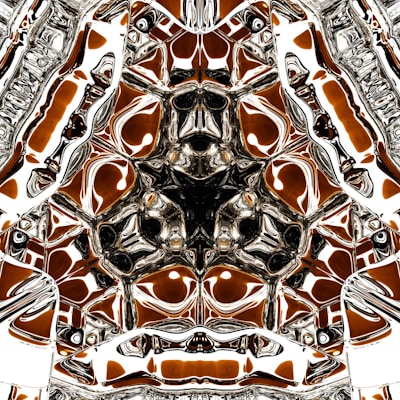 A complex abstract design featuring symmetrical patterns with metallic and reflective textures, creating intricate and kaleidoscopic visuals with a hint of depth.