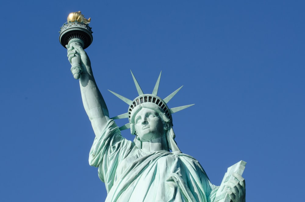 a statue of liberty with Statue of Liberty in the background