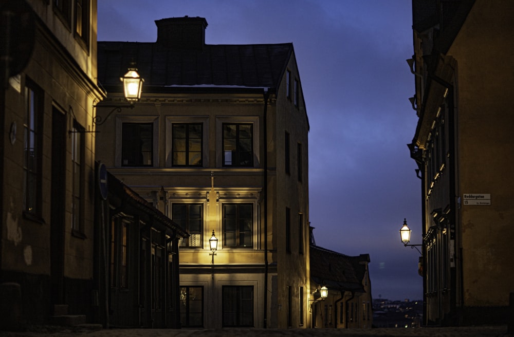 a row of buildings at night