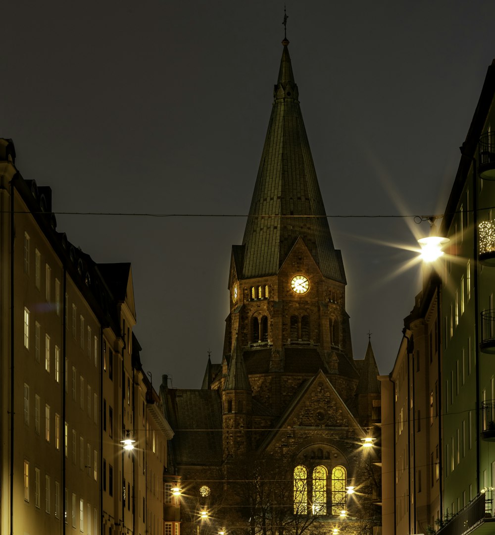 a tall building with a pointed roof