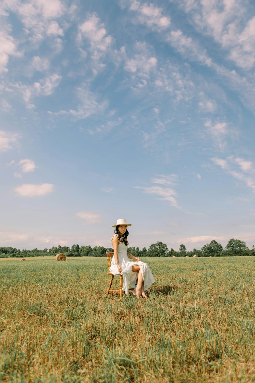 a person sitting in a field