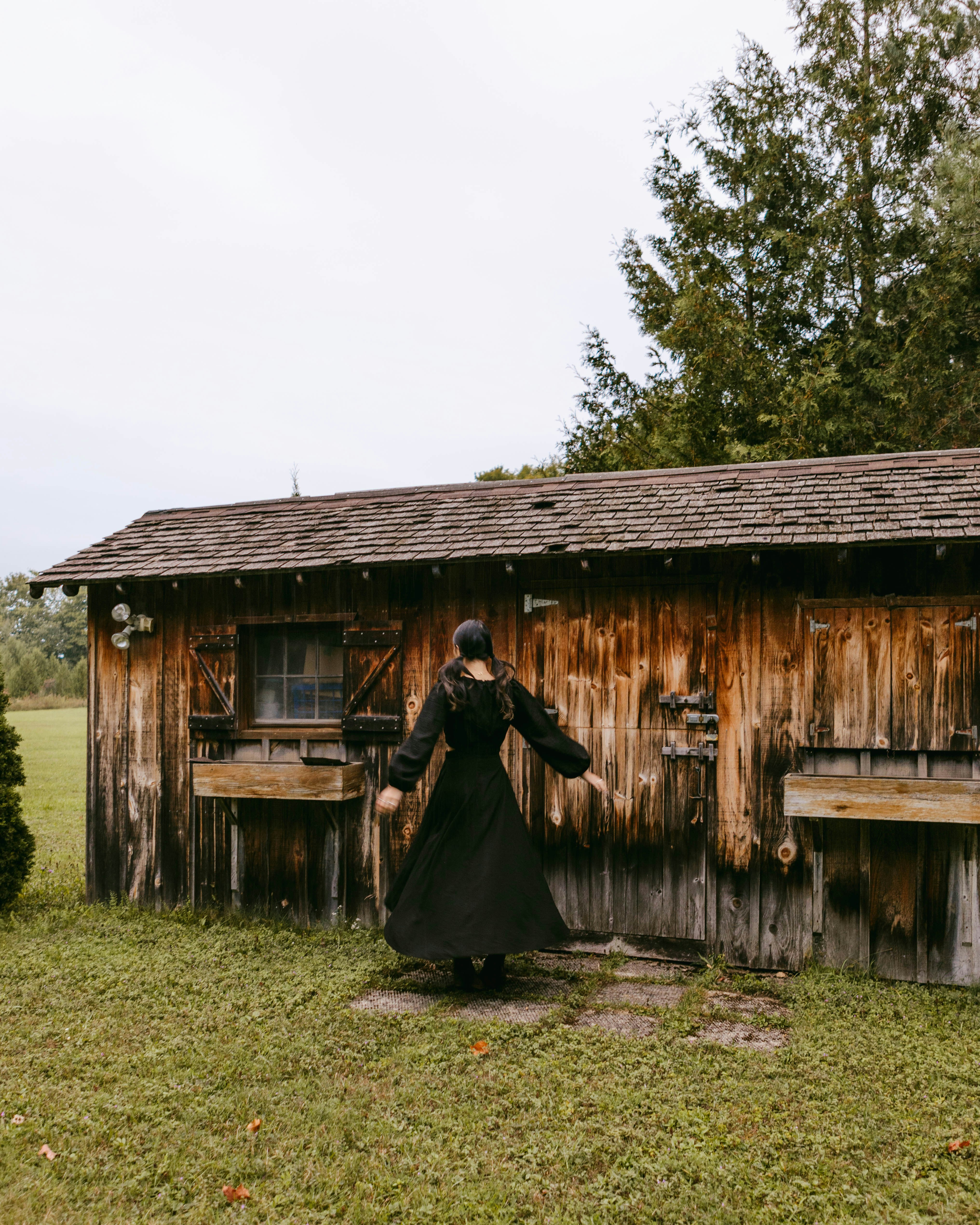 a person standing outside a house