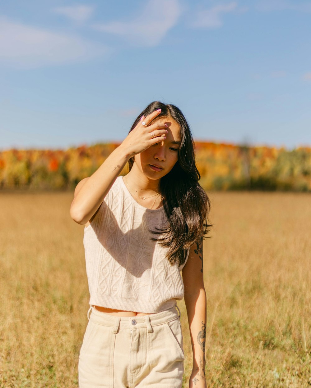 a person with the hands on the face