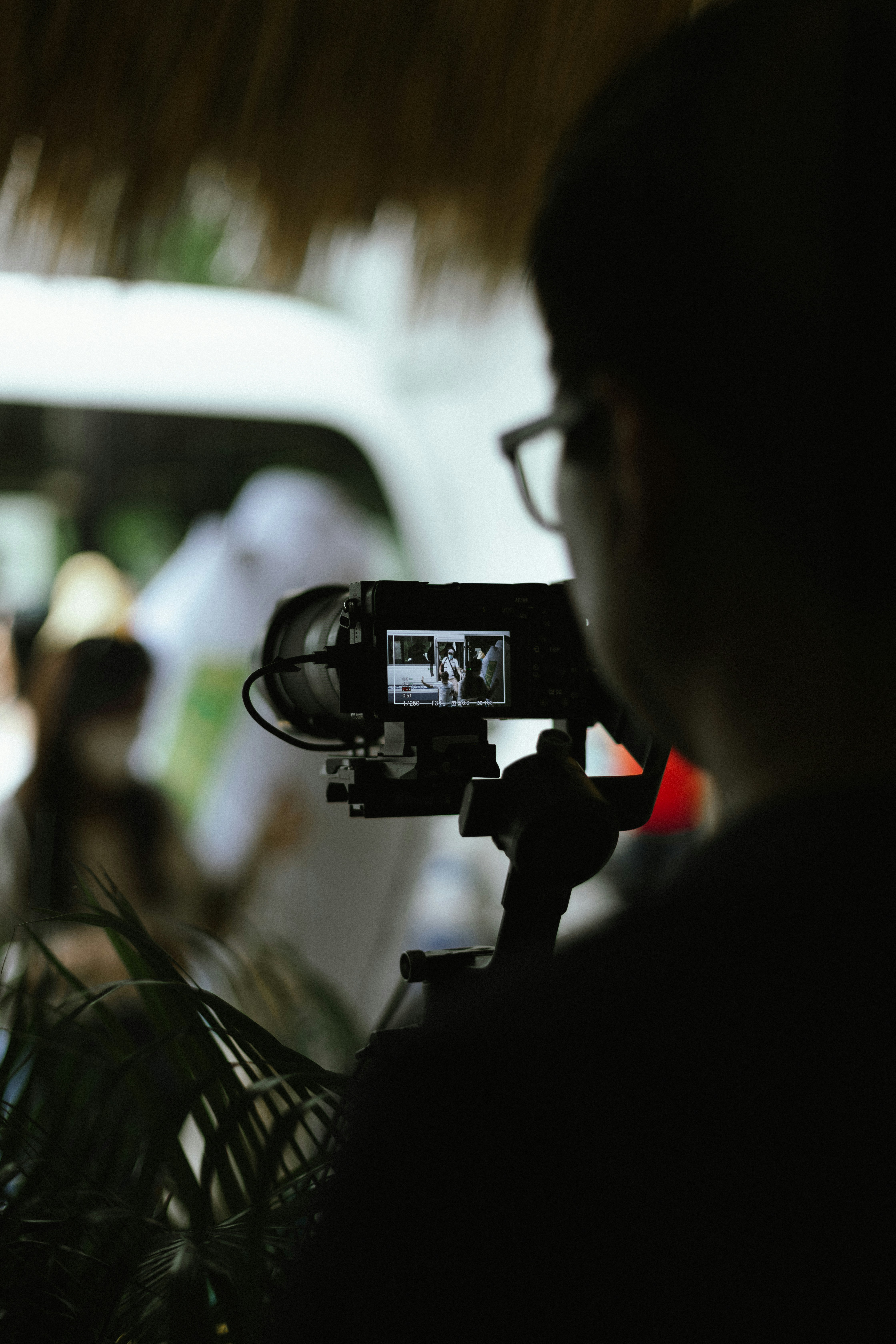 a person holding a camera