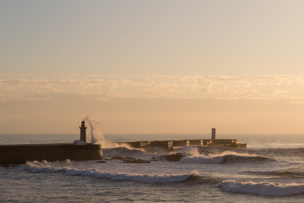 a lighthouse on a pier