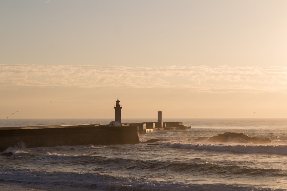 a lighthouse on a pier