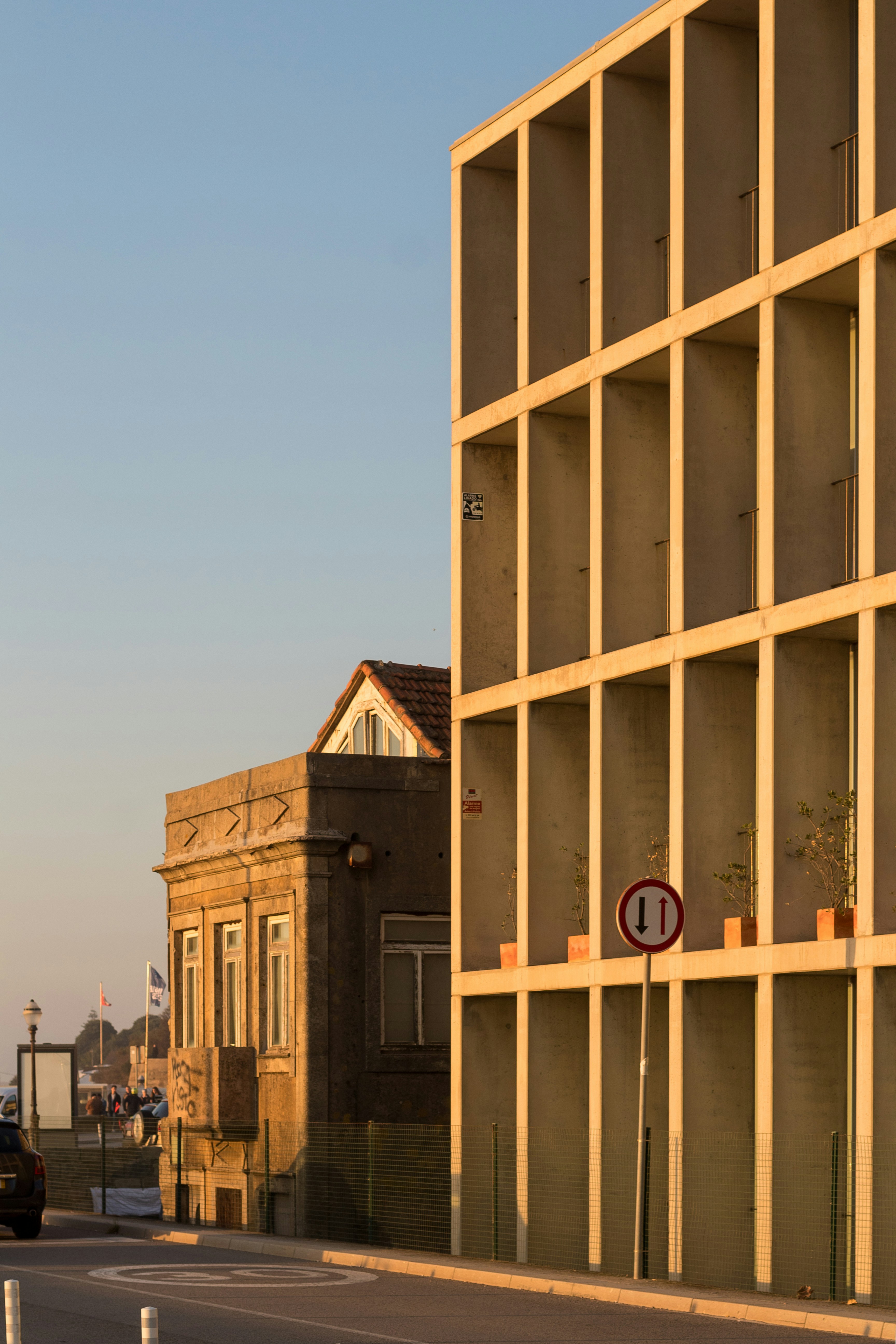 Sunsetting in front of the Rua da Praia Souto de Moura building.
