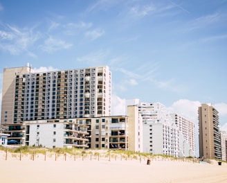 a beach with buildings along it