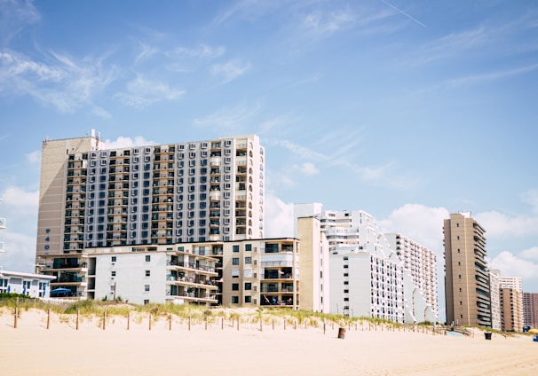 a beach with buildings along it