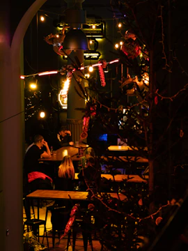 Cozy private party scene featuring ambient lighting and stylish decor elements.