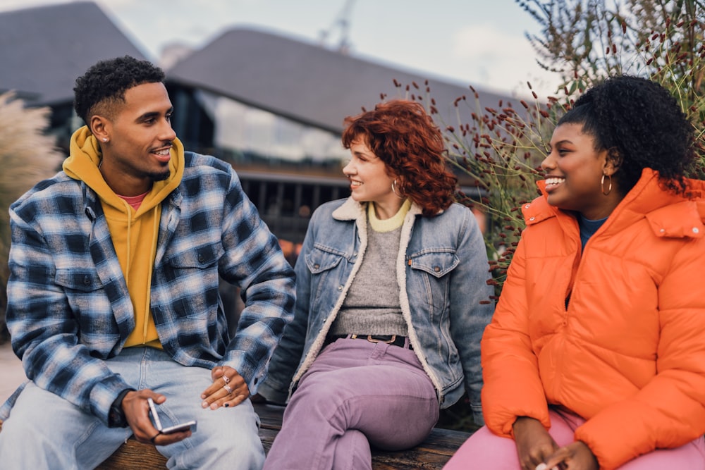 a group of people sitting outside