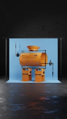 A whimsical robot-like figure constructed from industrial materials, featuring a cylindrical body and a funnel-shaped head. The structure is set against a light blue backdrop, supported by a stand on a dark floor.