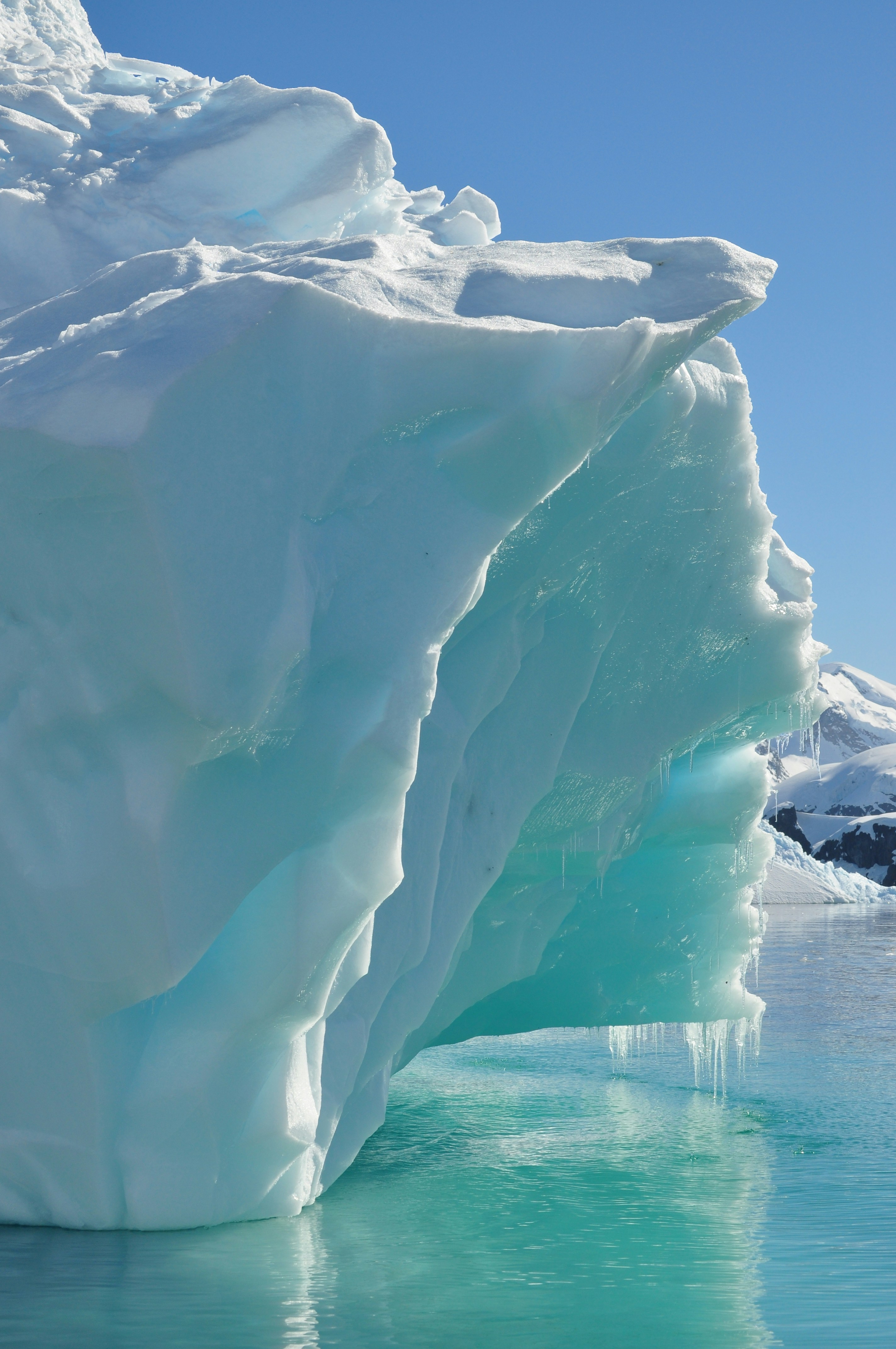 a large iceberg in the water