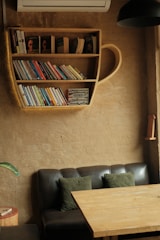 A cozy reading nook filled with books and plants.