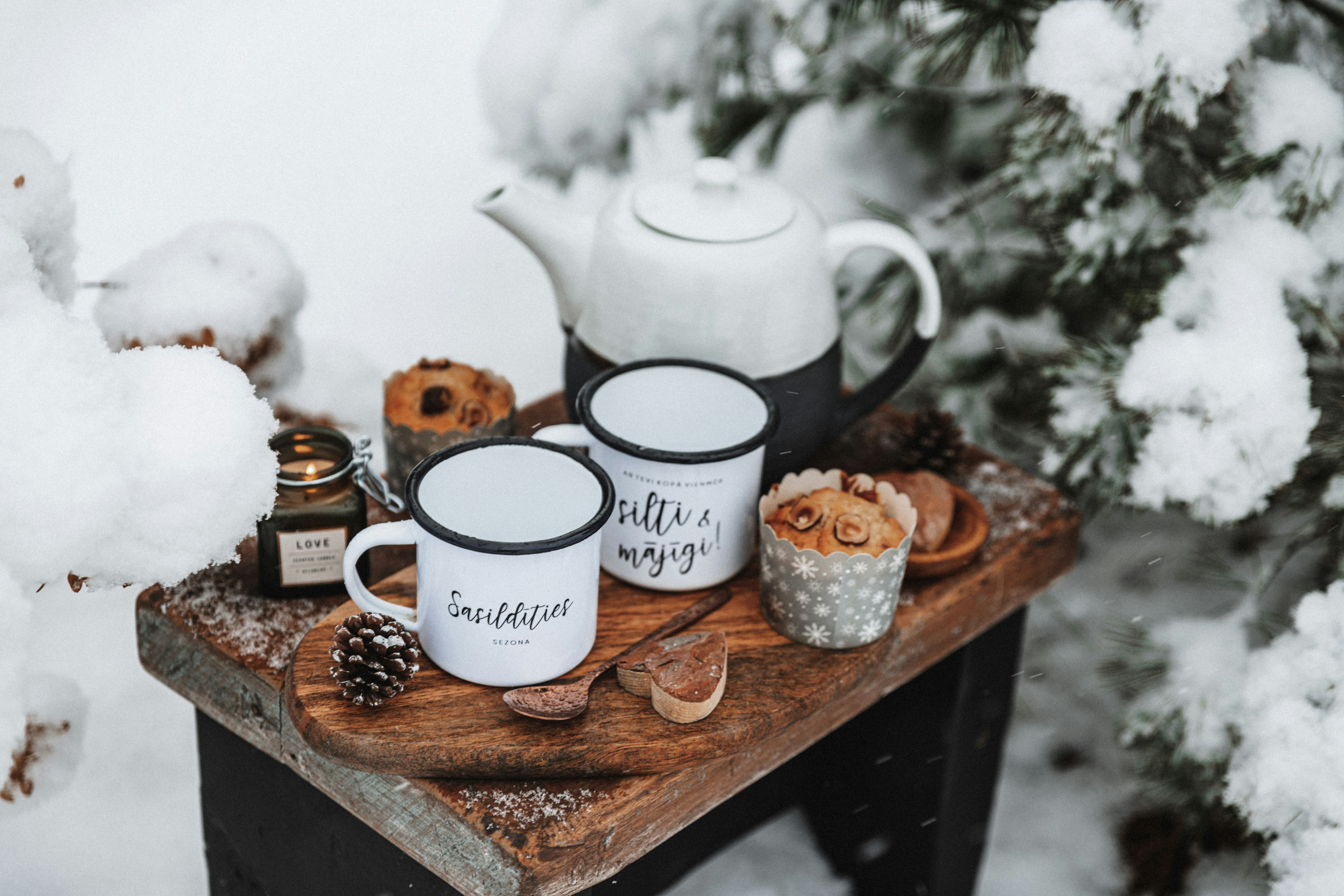 Two coffee mugs sitting on top of a white table photo  Free Green Image on  Unsplash
