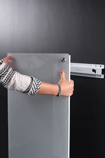 Photo of professional technician installing a UPVC door frame with precision tools