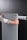 A person is holding a glass or acrylic panel with metal fixtures, likely installing or removing it from a wall mount bracket against a black background. The person is wearing a long-sleeved shirt with geometric patterns and has red nail polish.