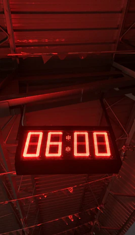 A dramatic timer counting down from 04:59 in bright red neon digits on a black background.