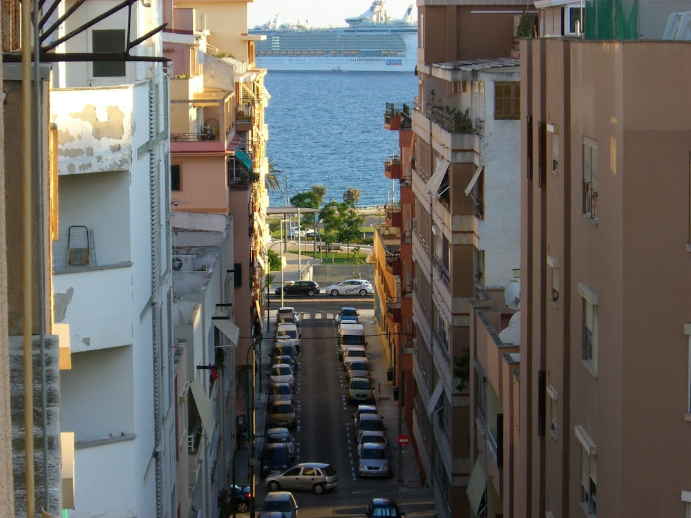 a street with cars and buildings along it