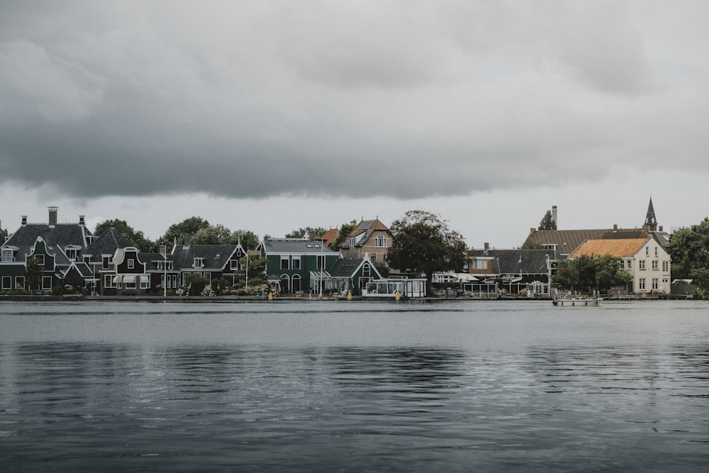 a body of water with buildings along it